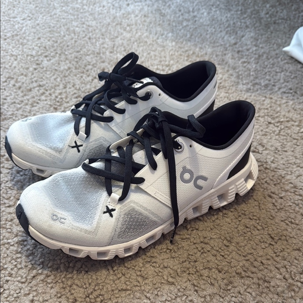 On Running White and Black Sneakers
